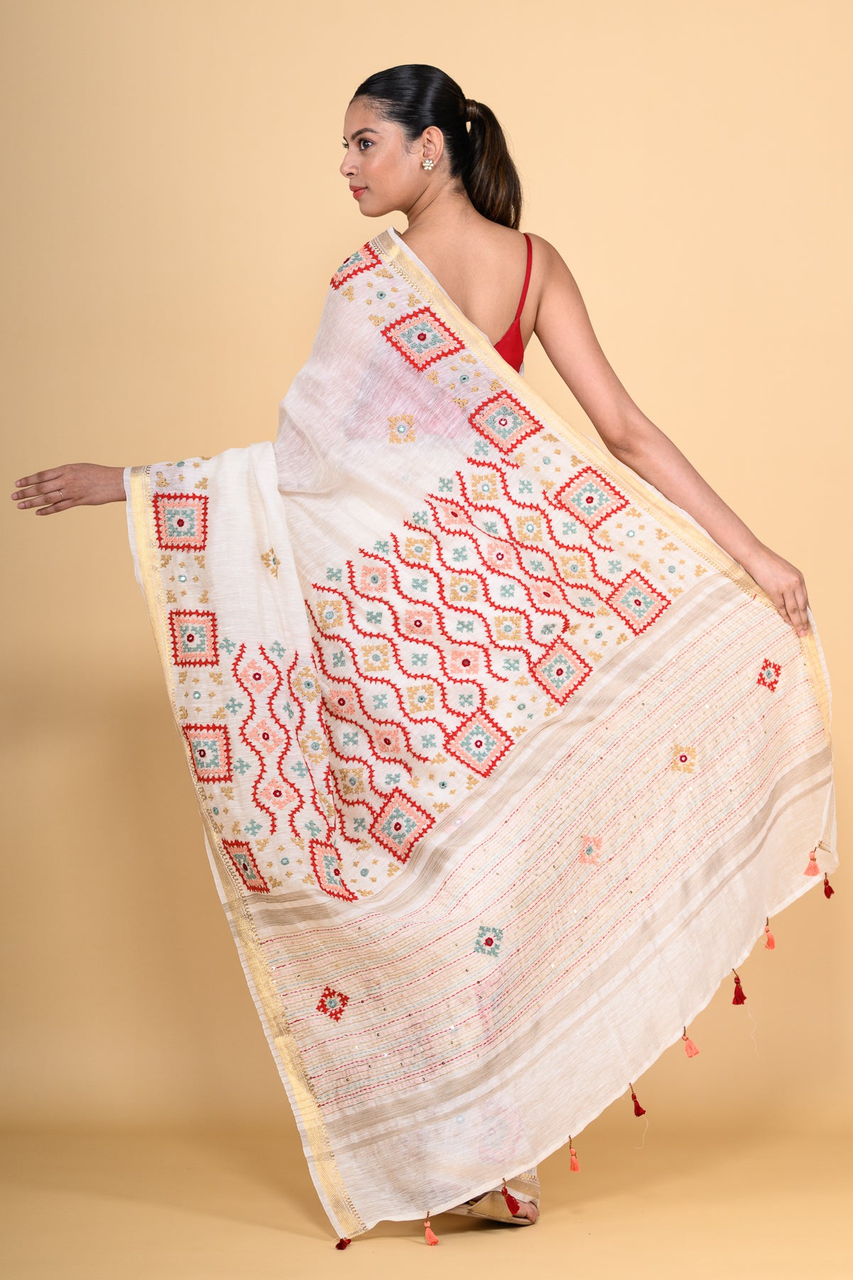 Pure Linen White Saree Highlighted with Tikki & Thread Work