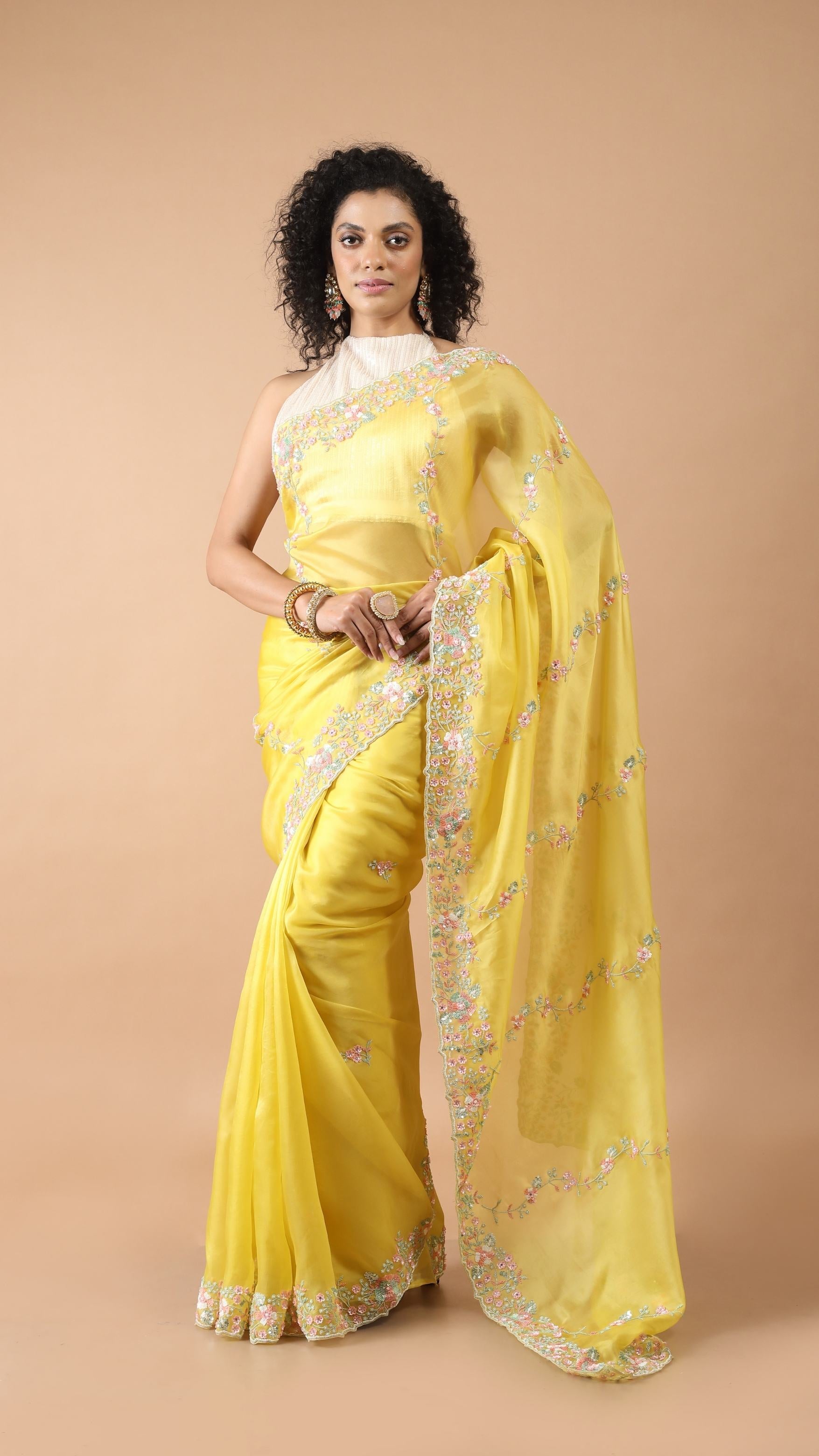 Inaya Mango Yellow Embellished Border Saree