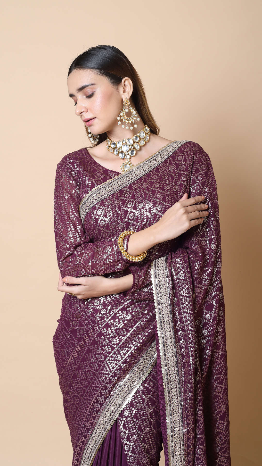 Heer Wine Georgette Sequin Saree with Intricate Border and Self Embroidered Saree