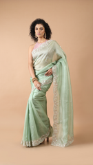 Inaya Foam Green Organza Floral Border Saree